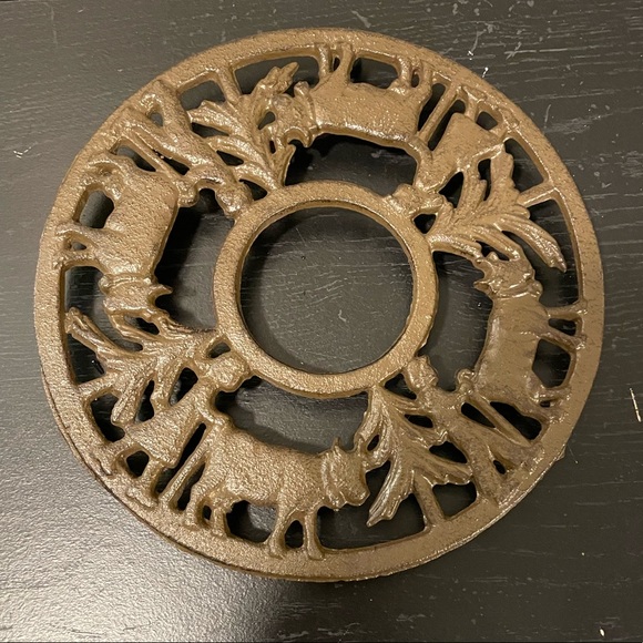 Vintage Cast Iron Trivet with boy and cow and girl with cow. EUC! - Picture 2 of 6